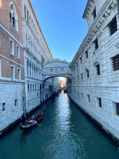 Gondola passing beneath the Bridge of Sighs in Venice